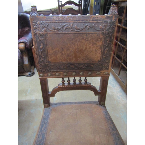 2221 - An Edwardian oak dining table, with canted corners raised on broad fluted supports and casters, 73 c... 