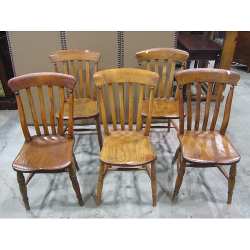 2236 - Five Windsor kitchen chairs, with elm seats, raised on turned legs and stretchers (5)