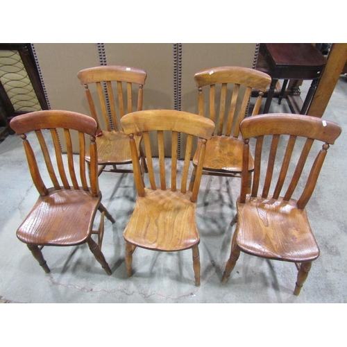 2236 - Five Windsor kitchen chairs, with elm seats, raised on turned legs and stretchers (5)