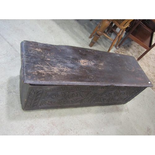 2237 - An 18th century and later over-carved elm coffer, 44cm high, 108 x 46cm.