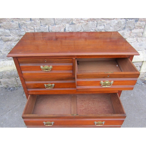 2255 - A satin walnut chest of two short and two long drawers, raised on a bracket base, 88cm high, 95 x 54... 