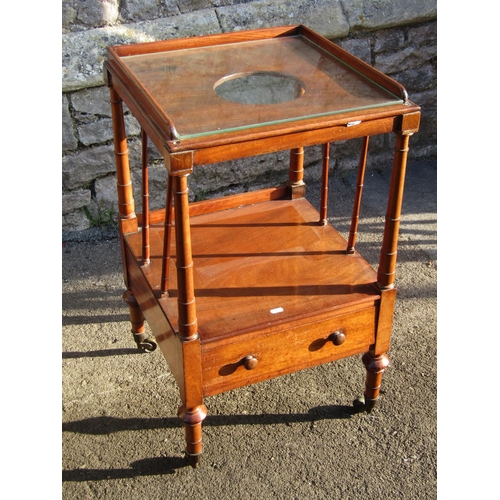 2265 - A 19th century mahogany bedside / washstand, with single frieze drawer, raised on turned supports an... 