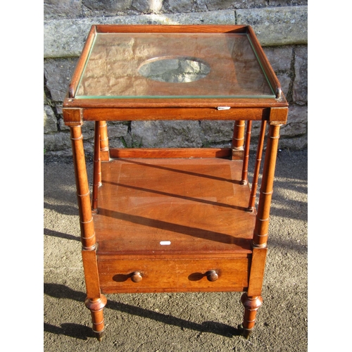 2265 - A 19th century mahogany bedside / washstand, with single frieze drawer, raised on turned supports an... 