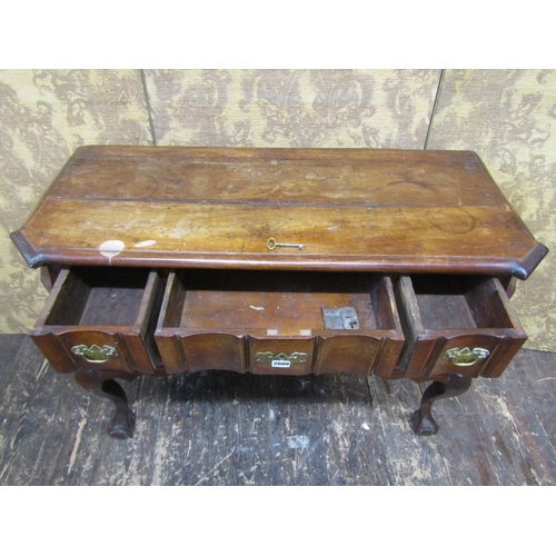 2658 - A colonial hardwood kneehole side table fitted with five drawers with shaped outline, raised on claw... 