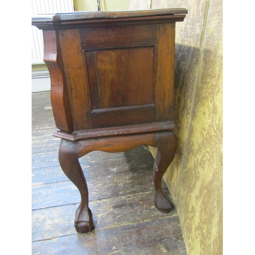 2658 - A colonial hardwood kneehole side table fitted with five drawers with shaped outline, raised on claw... 