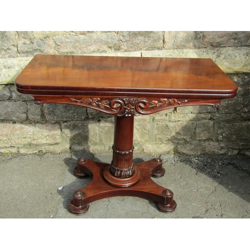 2659 - Regency mahogany D end fold over top tea table, raised on turned and carved column and platform base... 