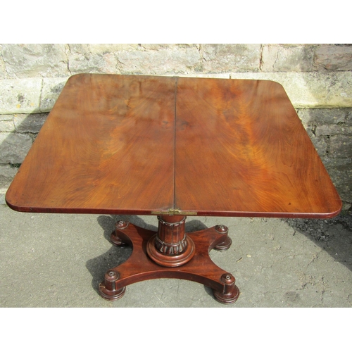 2659 - Regency mahogany D end fold over top tea table, raised on turned and carved column and platform base... 