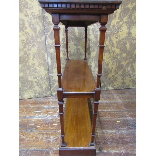 2643 - Edwardian mahogany three tier side table, raised on tapered square cut supports, on a plinth base wi... 