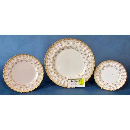 1004 - A mixed quantity of Spode gilt Fleur De Lys pattern tea and dinnerwares, to include lidded serving t... 