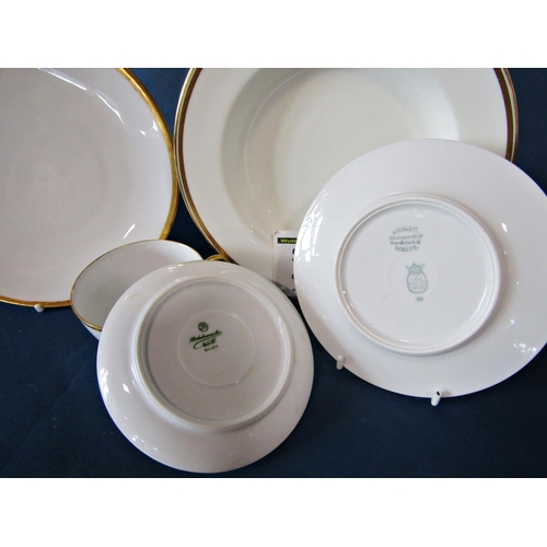 1007 - A quantity of German porcelain tea and dinner wares, with gilt borders and initialled ‘P’ together w... 