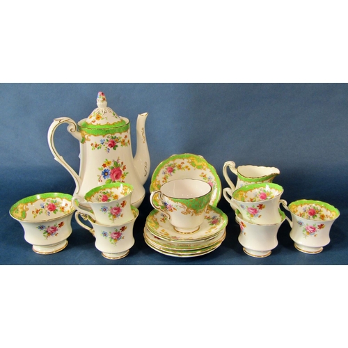 1017 - A Portmeirion 'Phoenix' coffee pot, cream and sugar jug and six coffee cans, together with Paragon f... 