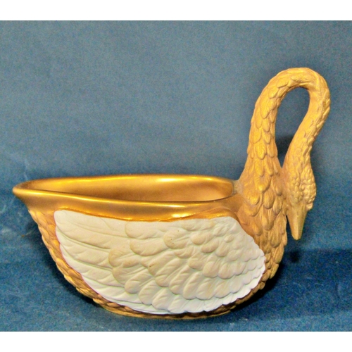 1023 - A Dresden gilt bisque porcelain swan cup and saucer (cup 8cm high, saucer 15 x 12cm) together with a... 