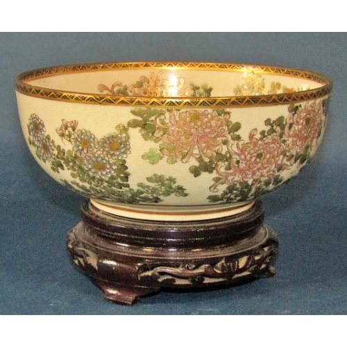 1047 - A 19th century Japanese Satsuma porcelain bowl, decorated with chrysanthemum and other blossoms, sig... 