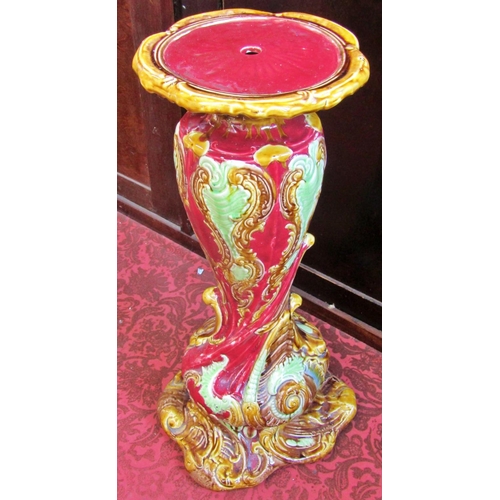 1069 - A 19th century Majolica type jardiniere stand, 62 cm high