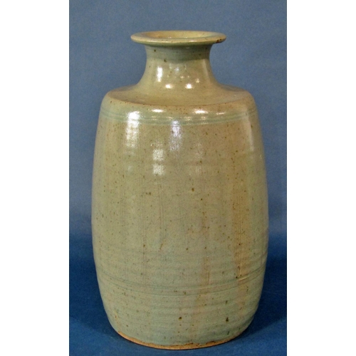 1091 - A group of Studio ware items to include a slipware type flagon, a large blue ground vase and two bow... 