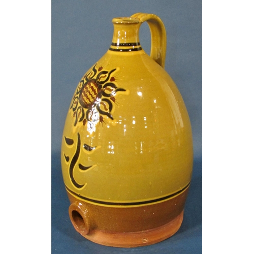 1091 - A group of Studio ware items to include a slipware type flagon, a large blue ground vase and two bow... 