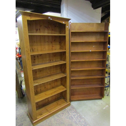 2152 - Two freestanding bookcases, a pine example with fluted sides, 200 cm high, 99 x 35 cm, together, wit... 