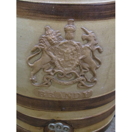 2155 - A Doulton Lambeth salt-glazed brandy, barrel with applied Royal armorial and label ‘Brandy’, 35 cm h... 