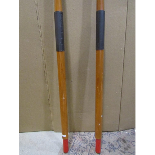 2160 - A vintage pair of wooden oars, 83cm high.