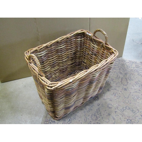 2168 - A large twin-handled wicker log basket, 56 cm high, 68 x 50 cm