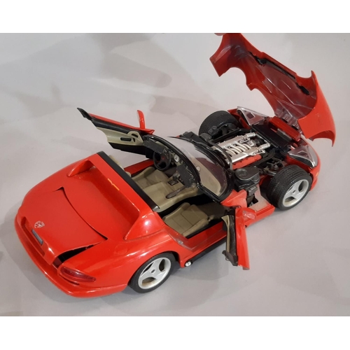 342 - Mixed group of models including 4 unboxed 1:18 scale cars- Viper Dodge, Jaguar and Ferrari all by Bu... 