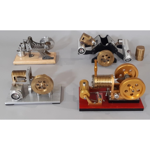 376 - Four kit built educational heat/ vacuum driven model engines including a  Stirling generator engine ... 