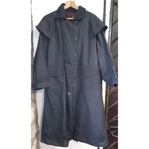 1740 - 'Stockman's Coat' jacket by Backhouse (Barbour Co), in dark blue heavy weight waxed cotton with stor... 