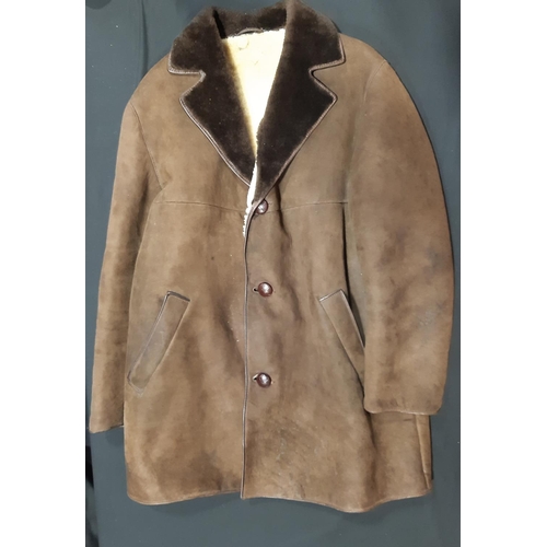 1742 - 3 sheepskin coats comprising a pale ladies jacket size 14 with toggle fastening, a dark brown men's ... 