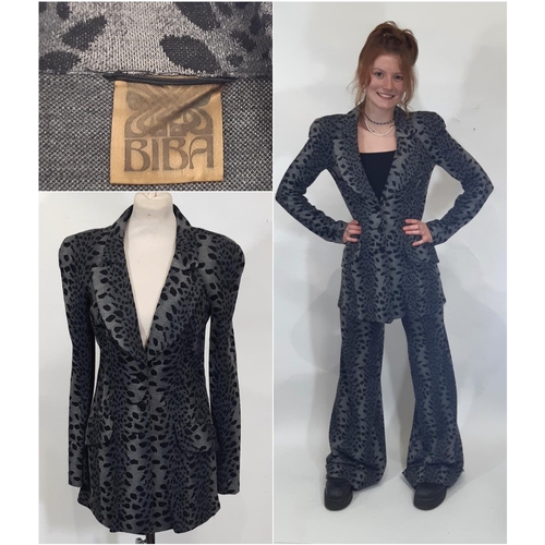 1746 - A late 1960s Biba two piece trouser suit in black/ grey leopard style jersey fabric; jacket has 3 fr... 