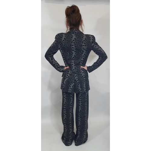 1746 - A late 1960s Biba two piece trouser suit in black/ grey leopard style jersey fabric; jacket has 3 fr... 