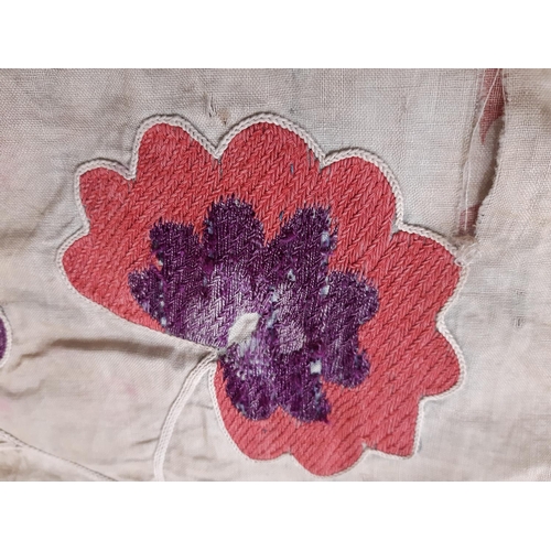 1751 - A small Uzbek type Suzani panel, probably 19th century with hand embroidered red and purple floral m... 