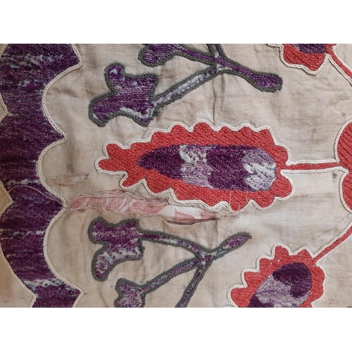 1751 - A small Uzbek type Suzani panel, probably 19th century with hand embroidered red and purple floral m... 