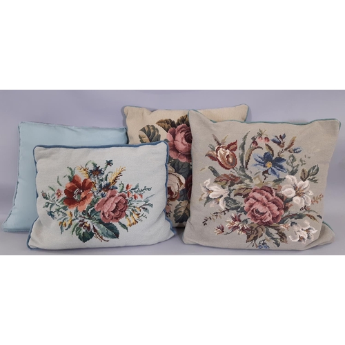 1753 - Three needlepoint cushions in floral design and one other. Largest is 46x46cm (4)