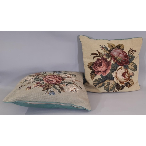 1753 - Three needlepoint cushions in floral design and one other. Largest is 46x46cm (4)