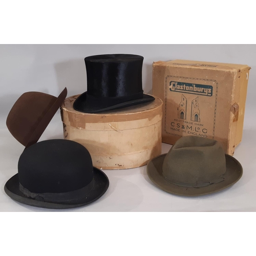 1765 - Four vintage hats including a black silk top hat by Scott & Co, internal size 20x16.5cm, a bowler ha... 