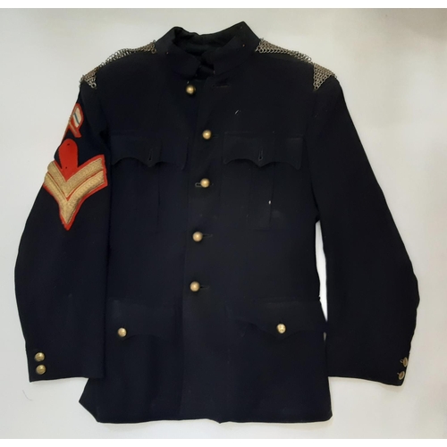 1767 - Early to mid 20th century military jacket in navy blue wool with 2 chevron sleeve stripes for rank o... 