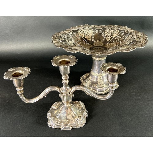 1162 - An Edwardian silver plated pierced comport and a silver plated three sconce candelabra.