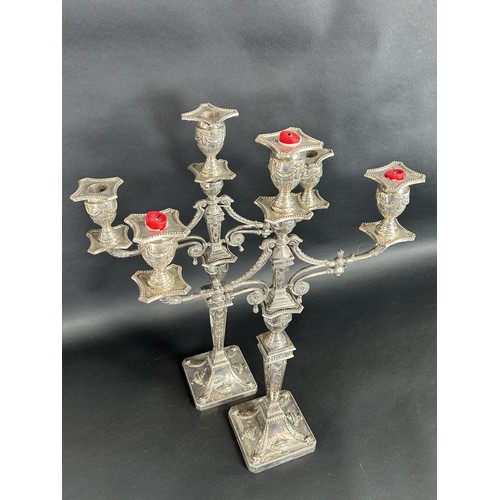 1163 - A large pair of silver plated Neoclassical style candelabra, three branches raised on square columns... 