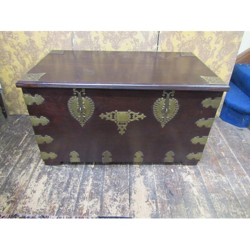 2735 - Late 19th century Anglo Indian hardwood coffer overlaid with brass banded borders, lock plates, etc,... 