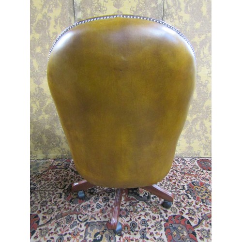 2728 - A good quality office chair upholstered in buttoned back leatherette finish with additional brass st... 