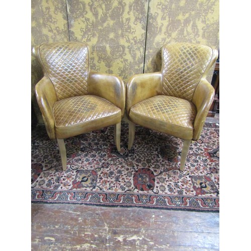 2724 - Timothy Olton - A pair of 'Side Saddle' tanned leather upholstered elbow chairs, cross hatched seats... 