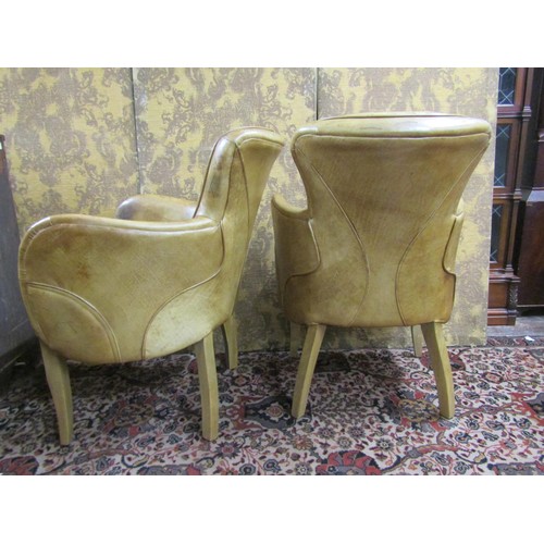 2724 - Timothy Olton - A pair of 'Side Saddle' tanned leather upholstered elbow chairs, cross hatched seats... 