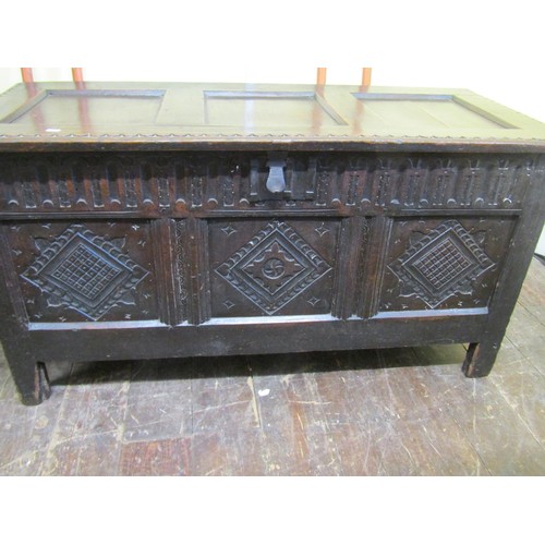 2723 - Late 17th century/early 18th century panelled oak coffer