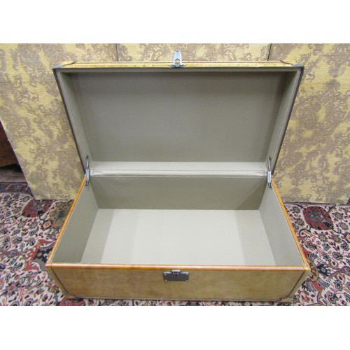 2718 - A good quality travelling trunk ottoman with pale tan coloured leather finish and studwork borders, ... 