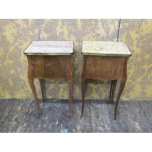 2716 - A pair of continental side tables each with shaped outline and enclosing two drawers set beneath fig... 