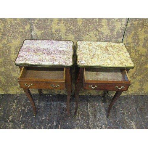 2716 - A pair of continental side tables each with shaped outline and enclosing two drawers set beneath fig... 