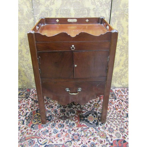 2712 - A Georgian mahogany tray top commode with pierced gallery with enclosed front on moulded supports, 5... 