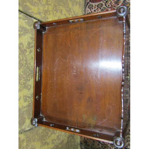 2712 - A Georgian mahogany tray top commode with pierced gallery with enclosed front on moulded supports, 5... 