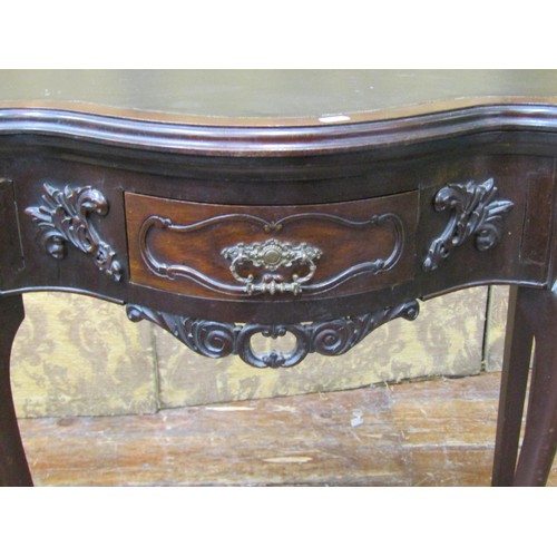 2664 - Edwardian mahogany serpentine foldover top card table with baize lined interior, enclosing a single ... 