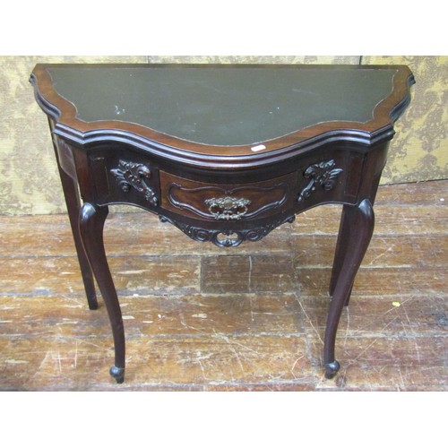 2664 - Edwardian mahogany serpentine foldover top card table with baize lined interior, enclosing a single ... 